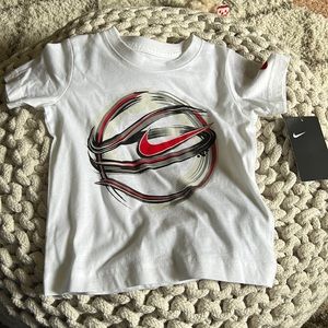 Brand new with tags Nike shirt. Size 2T